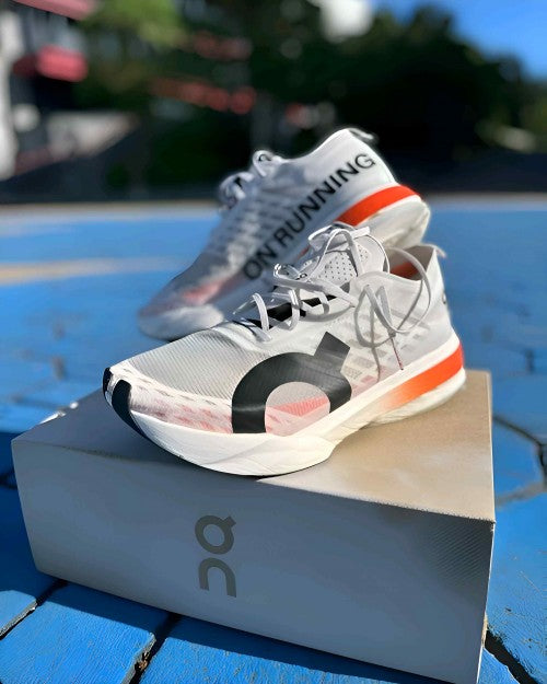 on Cloudboom Strike White Orange