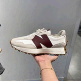 new balancee 327 Moonbeam Burgundy