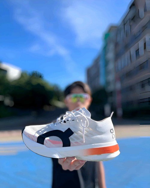 on Cloudboom Strike White Orange